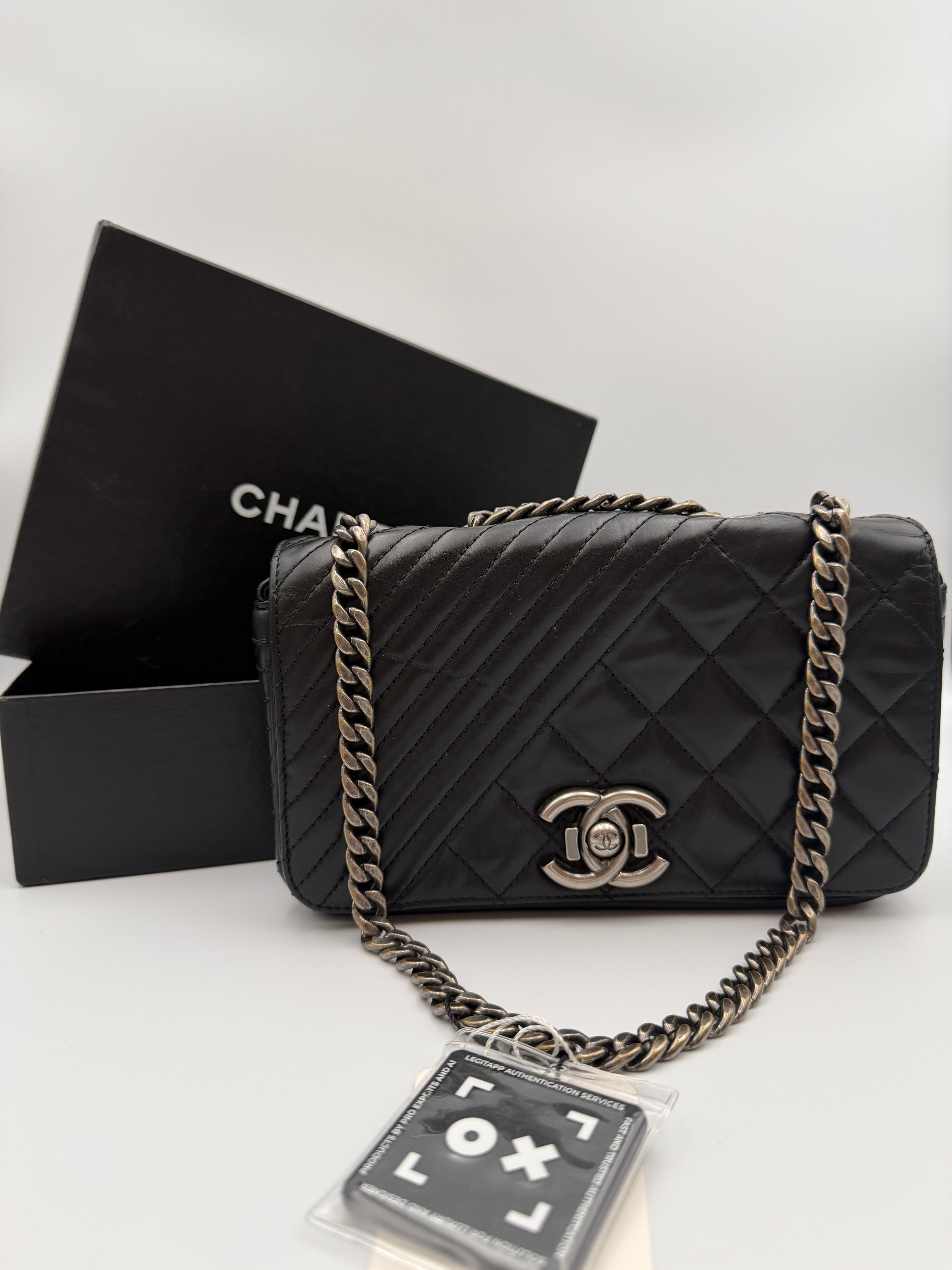 Chanel Quilted Aged Calfskin Coco Boy Flap Bag